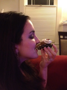 Gabrielle enjoys a cupcake